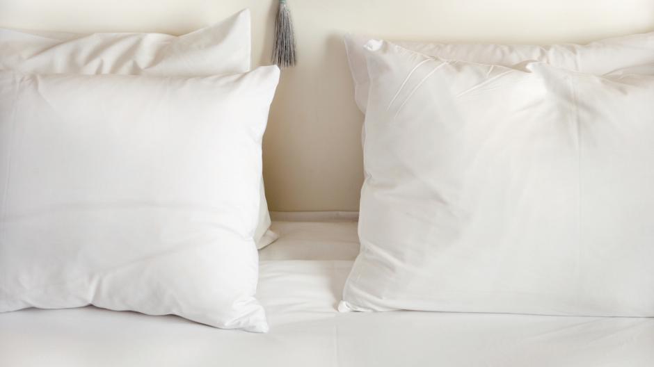 White pillows on bed
